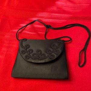 Clutch with cord strap
